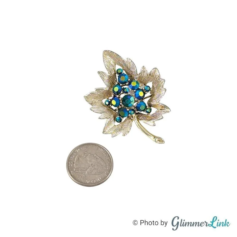 Vintage Blue Aurora Borealis Rhinestone Leaf Gold Tone Textured Brooch